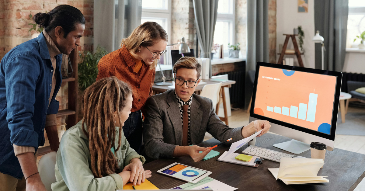 Employees checking out the latest HR trends